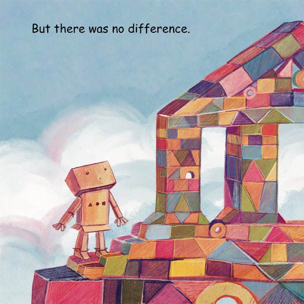 Cardboard robot staring at the stacked wood blocks.